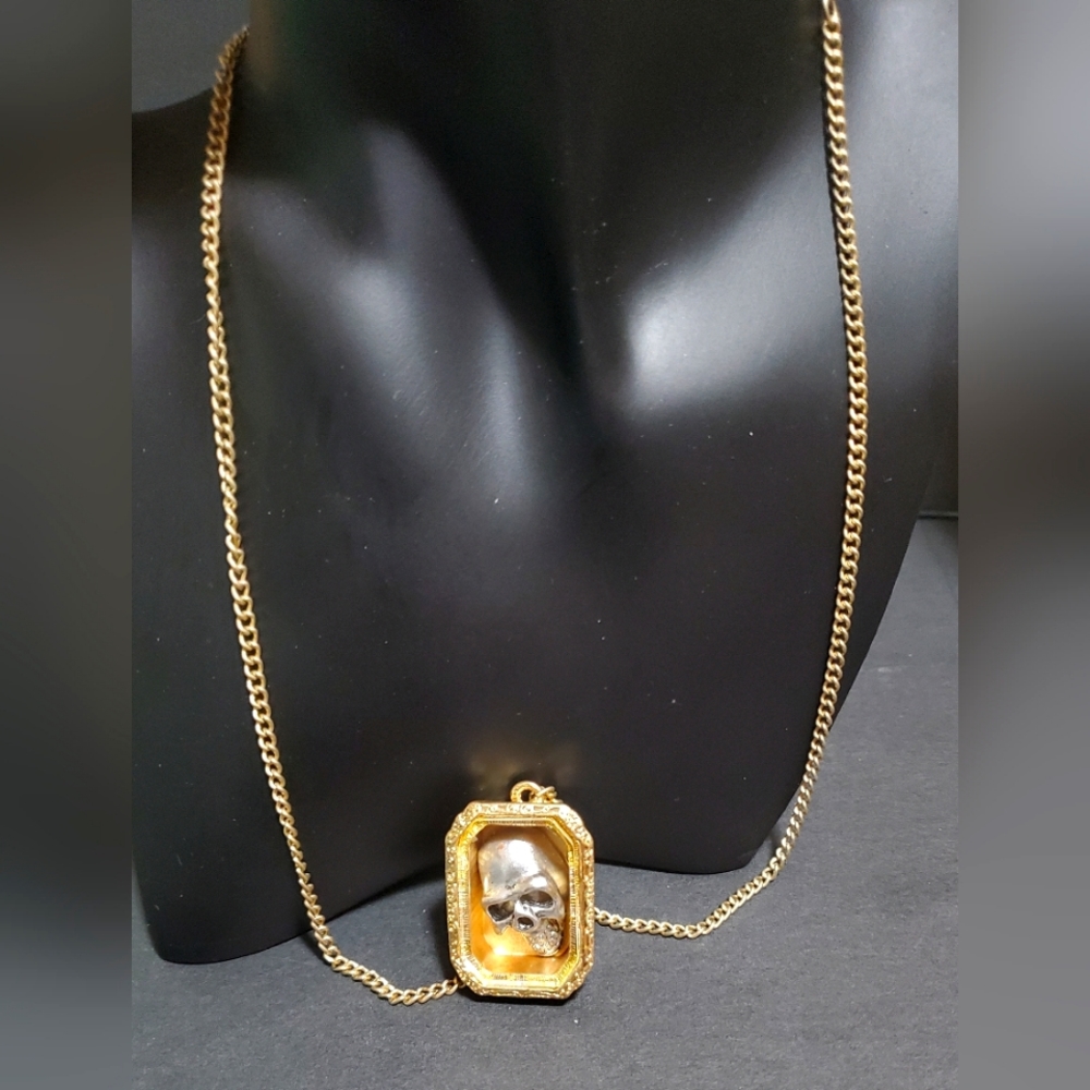 Gold color skull necklace
